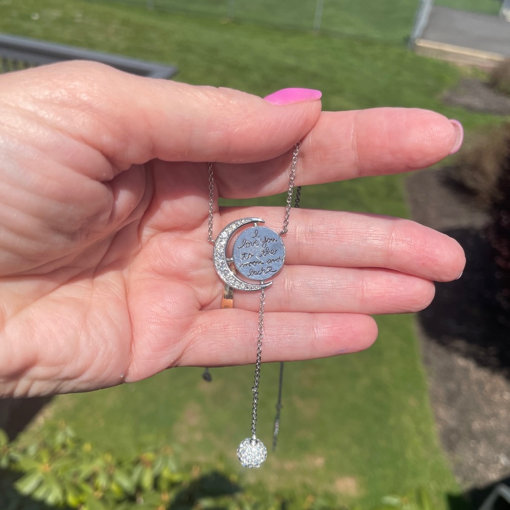 Silver necklace.